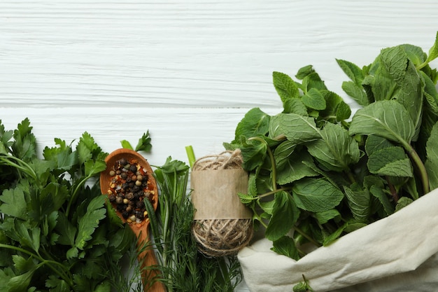 Fresh herbs on white wooden