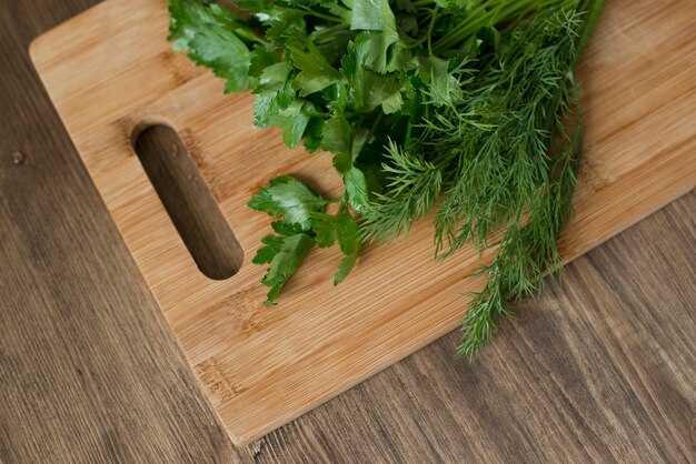 Fresh herbs on a wooden table