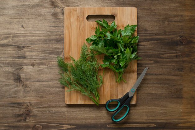 Fresh herbs on a wooden table