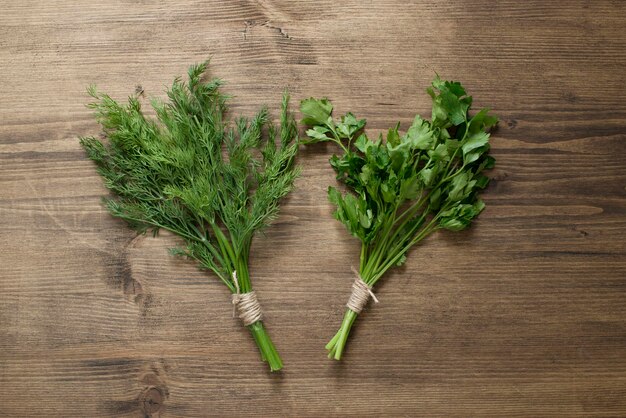 Fresh herbs on a wooden table