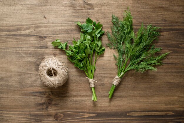 Fresh herbs on a wooden table