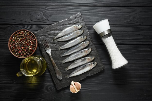 Fresh herring on rustic wooden background close up shot