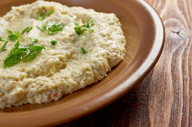 Photo fresh homemade  baba ghanoush .traditional lebanese . mediterranean food.farm-style