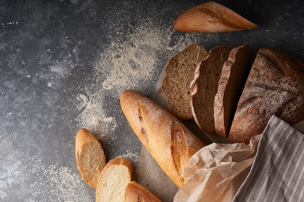 Fresh homemade bread, French baguettes, gluten-free gray bread Copy space