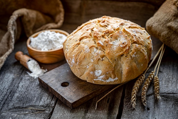 Fresh homemade bread on a wooden table