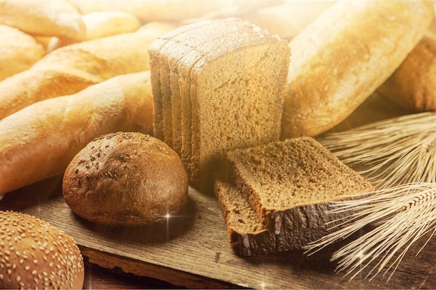 Fresh homemade bread on wooden table