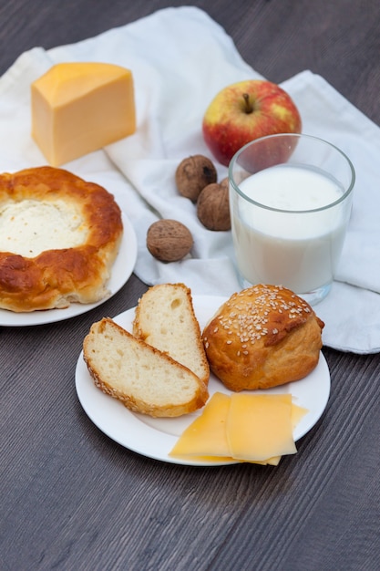 Fresh homemade buns with sesame and cheese 