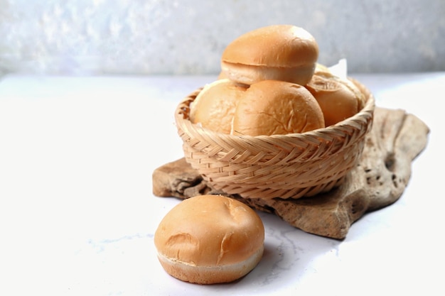 fresh homemade burger buns on white background