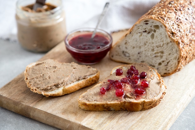 Fresh homemade chicken liver pate (rabbit, goose) with cranberry sauce.