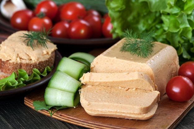 Fresh homemade chicken meat pate with vegetables