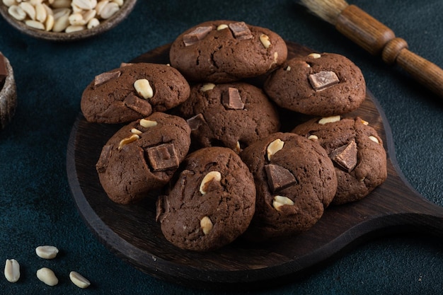 Fresh homemade chocolate chip cookies Brownie cookies Cookies with chocolate and nuts Vegetarian dessert American dessert