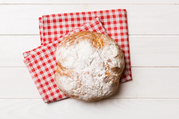 Fresh homemade crisp round bread on napkin top view Healthy unleavened bread French bread Top view Bakery products