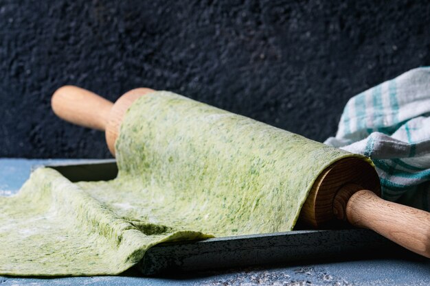 Fresh homemade green dough for pasta