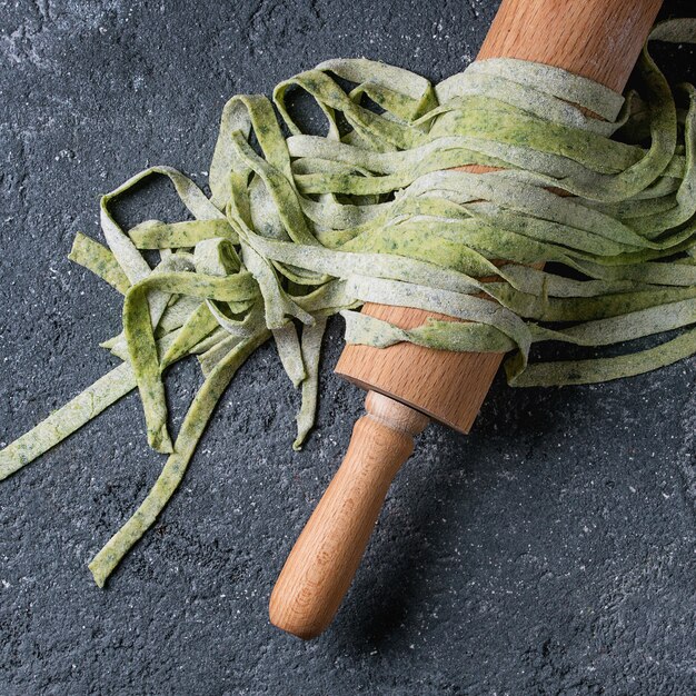 Fresh homemade green pasta tagliatelle