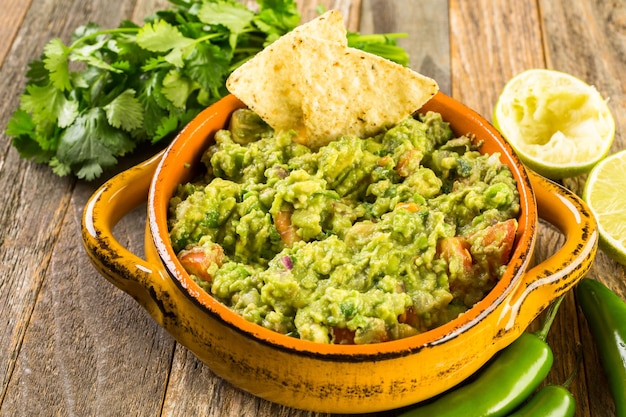 Fresh homemade guacamole in the bowl.in the bowl.