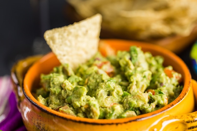 Fresh homemade guacamole in the bowl.in the bowl.