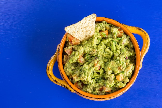 Fresh homemade guacamole in the bowl.in the bowl.