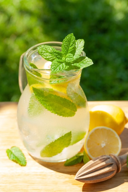 Fresh homemade lemonade with lemon and mint