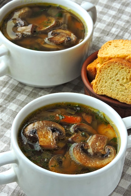 Fresh homemade mushroom soup with wheat croutons.