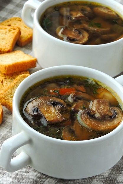 Fresh homemade mushroom soup with wheat croutons.