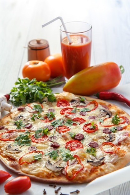 Fresh homemade pizza with tomatoes