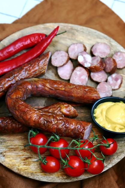 Fresh homemade sausages on a wooden tray