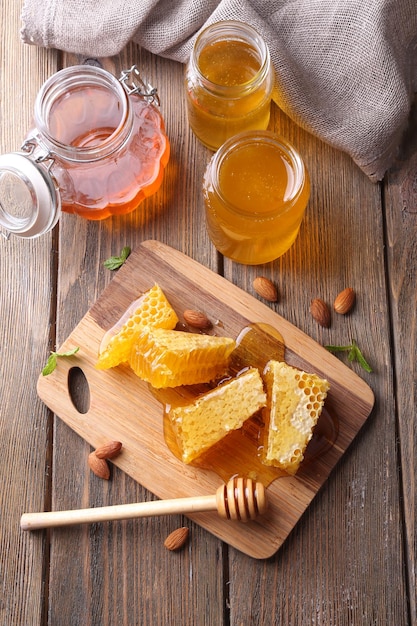 Fresh honey on wooden table