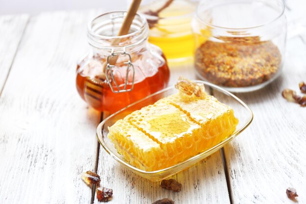 Fresh honey on wooden table