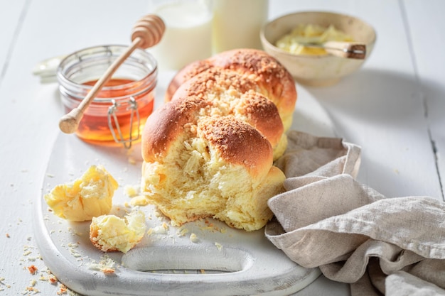 Fresh and hot golden challah for sweet breakfast