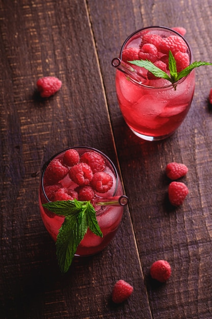 Fresh ice cold berry juice drink with mint