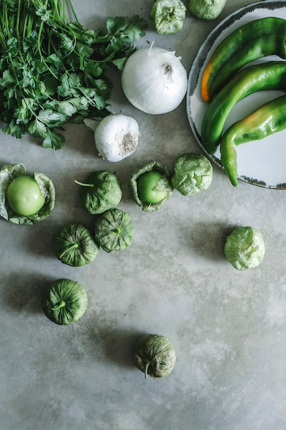 Fresh ingredients for green tomatillos salsa