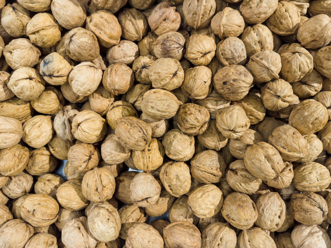 Premium Photo Fresh inshell walnuts in the supermarket Vegetables and