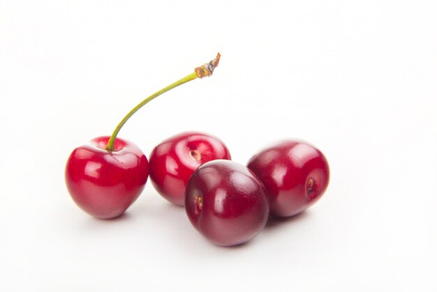 Fresh isolated red cherries