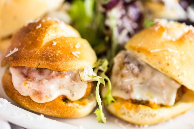 Fresh Italian meatball sliders on the table in Italian restaurant.