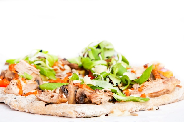 Fresh italian pizza with mushrooms, ham, tomatoes, cheese on light white background. Copy space. Homemade with love. Fast delivery. Recipe and menu.