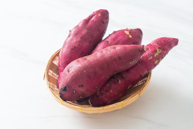 fresh Japanese sweet potatoes on basket