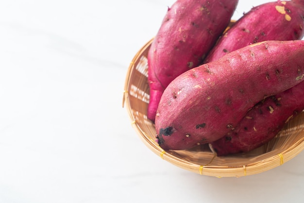 fresh Japanese sweet potatoes on basket