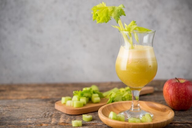 Fresh juice apple and celery in a clear glass, vegetarian food, clean food concept