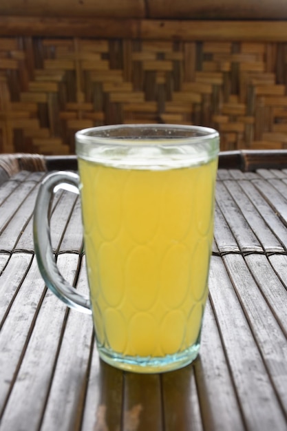 fresh juice in glass and bottle