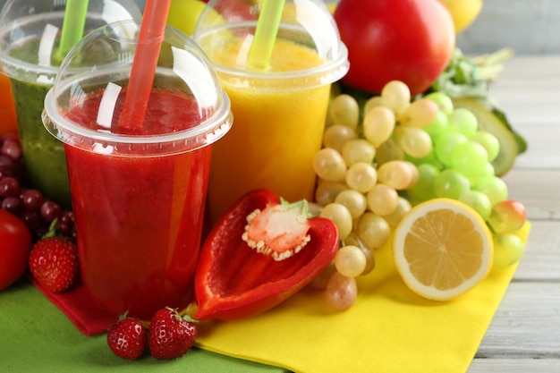 Fresh juice mix fruit healthy drinks on wooden table background