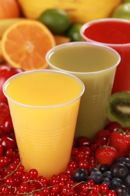 Fresh juices in drinking cups