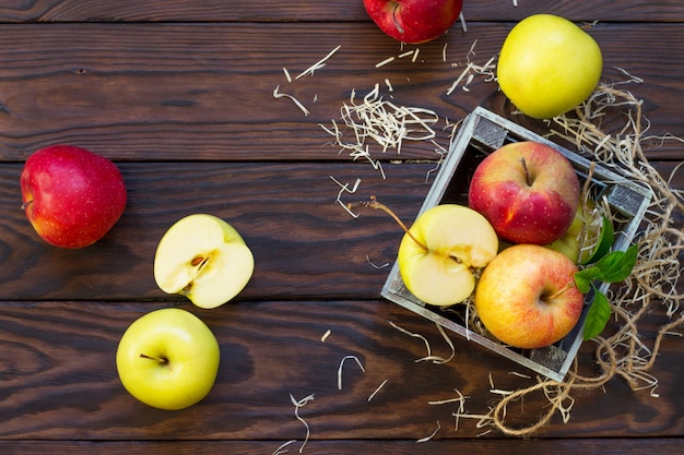 Fresh and juicy apples in a wooden box