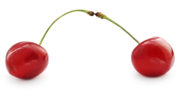 Photo fresh juicy cherry over white background