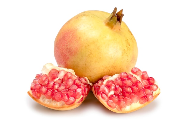 Fresh juicy pomegranate in whole and cut isolated on white background with clipping path