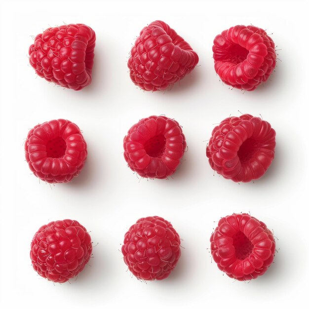 Fresh juicy raspberries lying on a white background top view