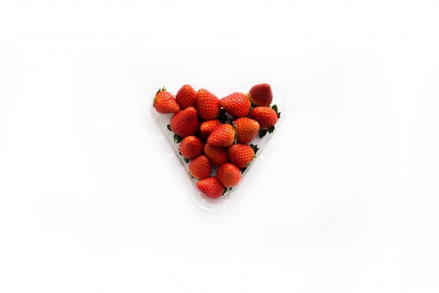 Fresh juicy strawberries in a heart shaped box