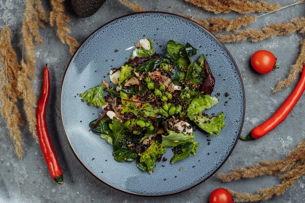 Fresh lamb lettuce salad with avocado cucumber salmon cherry tomatoes