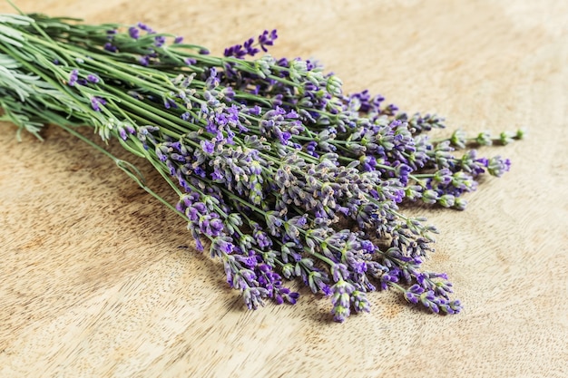 Fresh lavender bouquet on wooden background copy space