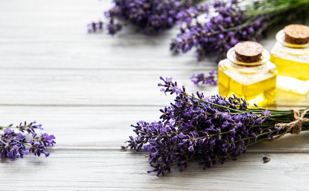 Fresh lavender flowers and essential oils in bottles