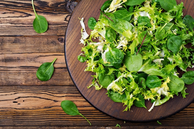 Fresh leaves of mix salad . Flat lay. Top view